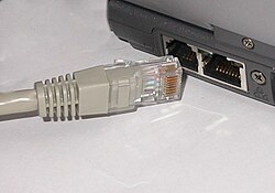 ตัวอย่างสาย LAN แบบ Twisted Pair และหัว RJ45