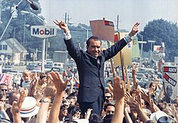 Nixon surrounded by a crowd of supporters