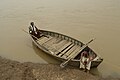 คนพายเรือในแม่น้ำโซน